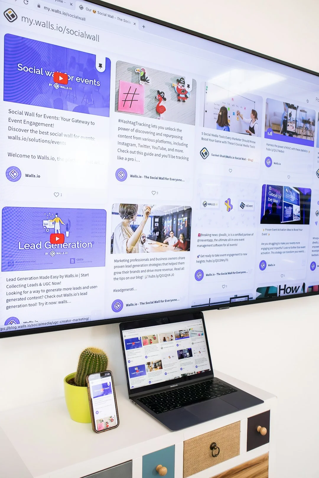 A contemporary workspace showcasing a laptop, tablet, and smartphones, ideal for tech and freelance use.